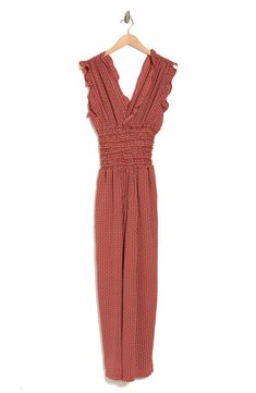 This wide-leg crepe jumpsuit that pairs pretty ruffles with flattering ruching is perfectly ready for the workday and after-hours events. 57" length (size Medium) 96% polyester, 4% spandex Machine wash, line dry Imported Sleeveless Ruched Jumpsuits And Rompers For Spring, Spring Sleeveless Ruched Jumpsuits And Rompers, Chic V-neck Jumpsuits And Rompers With Smocked Back, Spring Date Night Jumpsuit With Smocked Back, Chic Spring Jumpsuit With Smocked Bodice, Spring V-neck Jumpsuits And Rompers With Smocked Back, Fitted V-neck Jumpsuits And Rompers With Smocked Back, Spring Jumpsuits And Rompers With Smocked Back And V-neck, Summer Workwear Jumpsuits And Rompers With Elastic Waistband