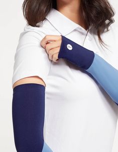 [[start tab]] SUN PROTECTIVE ARM SLEEVES COOLING SUN PROTECTION Our Colour Block Arm Sleeves feature a two-tone twist for a sophisticated pop of colour. Made in our CoolaSun Breeze fabric, which is our most lightweight fabric and has a cooling effect on the skin, as well as being incredibly soft, supple and flexible. Our Arm Sleeves are ideal when wearing a short sleeve t-shirt or short sleeve polo to protect your arms and hands from harmful UV rays. With thumbholes: This style enables you to pu Arm Sleeves, Arm Sleeve, Colour Block, Short Sleeve Polo, Uv Rays, Woman Colour, Upf 50, Lightweight Fabric, Sun Protection