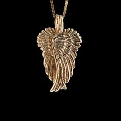 Two separate and detailed Angel Wings hang from a single chain. Each 14k gold wing is 1 1/8" high and 7/16" wide. Notice how when hung together, they form the shape of a heart? Wear them together, or wear one and gift one of the Wings to a significant other in your life. The gold chain is not included in the price. If you would like a solid 14k gold chain please select the stye and length from the option menu. If you would prefer a different style or length please contact us.All Marty Magic Jewe Elegant Gold Wing-shaped Jewelry, Elegant Wing-shaped Gold Jewelry, 14k Gold Wheat Chain Jewelry For Anniversary, Elegant Wing-shaped Yellow Gold Necklace, Elegant Yellow Gold Wing-shaped Necklace, Elegant Winged Gold Jewelry, Elegant Gold Winged Jewelry, Elegant 14k Gold Wing-shaped Jewelry, Gold Winged Sterling Silver Jewelry