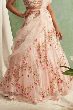 Blush pink organza lehenga with all-over multi-color floral motif thread work. Comes with jaal dori worked dupatta, belt and embellished blouse.
Component: 3
Embroidered
Neckline: U Neck
Sleeve Length: Sleeveless
Fabric: Organza, Chanderi
Color: Pink

Cutwork border
Tassel tie-up back
Closure: Blouse: Back hooks - Aza Fashions Pink Organza Lehenga, Embroidered Bridal Lehenga, Organza Lehenga, Plunging Neck, Embellished Blouse, Embroidered Neckline, Style Blouse, Corset Style, Thread Work