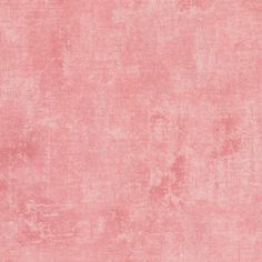 an old pink wallpaper with faded edges and some stains on the surface, as well as