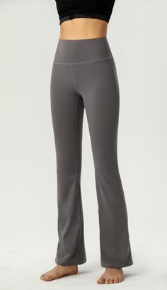 The EMES SHOP pants are detailed with a high rise waist. wide waistband. and are fitted down the thigh and flare at the ankle. Features back body contouring seams. These breathable. buttery soft. lightweight. sweat-wicking stretchy yoga pant leggings are perfect for a quick workout. or to throw on when spending the morning out doing errands. Finish off the look with a crewneck and sneakers for a polished athletic look. MATERIAL: 75% Nylon. 25% Spandex MEASUREMENTS: X-Small : 0-... Gray Elastane Yoga Pants, Gray High Stretch Elastane Yoga Pants, High Stretch Gray Elastane Yoga Pants, High Stretch Solid Color Pants For Pilates, Gray Full-length Elastane Yoga Pants, Gray Full Length Elastane Yoga Pants, Gray Stretch Yoga Pants Athleisure Style, Comfort Waistband Solid Yoga Pants, Gray Stretch Yoga Pants In Athleisure Style