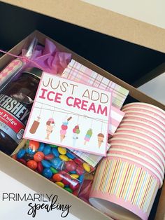 the ice cream box is packed with candy, candies and other items to be eaten