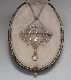 Antique Art Nouveau diamond necklace in 9K yellow gold and 925 silver. 63 pieces of diamond, 2.68 carat. In its original - quite worn - box. It has been hallmarked posteriorly, therefore it has hallmarks that were used from 2016. It is present in the original 1913 catalogue of the jeweller. The jeweller was Franz Joseph's Purveyor to the Imperial and Royal Court. The catalogue is not part of the listing. The inside diameter of the necklace is 45 cm. Originally it can be used as a brooch, but the Victorian Diamond Necklace With Single Cut Diamonds, Antique White Gold Diamond Necklace With Single Cut Diamonds, Vintage Diamond Cut Necklace In Diamond White, Antique White Gold Diamond Necklace, Vintage Diamond White Necklace With Diamond Cut, Victorian Diamond Necklace With Single Cut Diamonds For Wedding, Antique Silver Diamond Necklace With Diamond Accents, Vintage White Gold Diamond Necklace With Single Cut Diamonds, Victorian Wedding Necklaces With Single Cut Diamonds