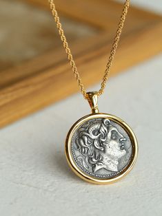 Introducing our "Classic Alexander Silver Coin Plus Necklace" – a timeless and sophisticated piece that combines the allure of a classic coin pendant with an additional layer of elegance, creating a versatile and stylish necklace.Key Features:Classic Coin Pendant: The necklace features a classic Alexander silver coin pendant, evoking a sense of history and timeless charm. The coin design adds a touch of vintage sophistication to the overall aesthetic.Additional Layer: Enhancing the necklace's el Sterling Silver Coin Necklace, Statue Of Athena, Silver Coin Jewelry, The Goddess Of Victory, Ancient Coin Pendant, Round Shield, Goddess Of Wisdom, Goddess Of Victory, Silver Coin Necklace