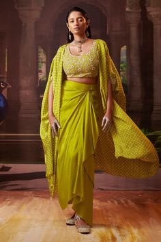 Lime green silk cape with placed pearl embroidered floral motifs on a bandhani print. Comes with padded embroidered blouse and draped skirt. - Aza Fashions Elegant Royal Dresses, Bandhani Blouse, Cape Set, Indian Wedding Lehenga, Mehendi Ceremony, Silk Cape, Trendy Outfits Indian, Silk Crop Top, Pearl Embroidery