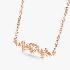 Jewelry Closure: Spring Ring ClaspLink Construction: SolidShape: HeartMetal Color: RoseChain Length: 18 InchChain Width: .6 MillimetersPendant Length: 6.2mmPendant Width: 26mmChain Construction: RopeCare: Wipe CleanMetal: 10k Rose GoldNecklace Type: Pendant NecklacesCountry of Origin: Imported Rose Gold Double Heart Jewelry For Valentine's Day, Rose Gold Clavicle Chain For Valentine's Day, Rose Gold Double Heart Jewelry With Adjustable Chain, Rose Gold Metal Heart Pendant Jewelry, Heart-shaped Rose Gold Charm Necklace, Elegant Rose Gold Heart Necklace, Valentine's Day Rose Gold Heart Clavicle Necklace, Rose Gold Clavicle Chain Necklace For Mother's Day, Rose Gold Adjustable Chain Necklace For Anniversary