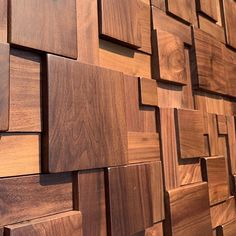 a wooden wall with many pieces of wood on it