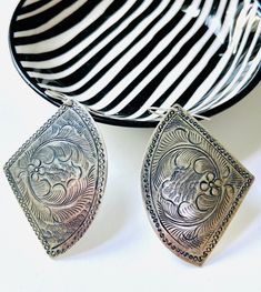 "Unique quarter-circle lightweight pendants are hand-etched vintage brass from the 80s finished in silver.  These are great everyday earrings and part of a whole collection of Mexican style stamped pendant. You'll get one and want them all. * Each pendant is approximately 1 1/2\" long x 1 1/2\" wide at the widest point.  * Earring backs are high quality sterling silver (.925) French loop or lever back ear wire. Clip on earrings for non-pierced ears available. Choose your preference from the drop Vintage Brass Earrings With Engraved Details, Vintage Brass Earrings With Engraving, Vintage Engraved Brass Earrings, Antique Silver Engraved Earrings For Gift, Antique Silver Engraved Earrings Gift, Bohemian Engraved Metal Earrings, Vintage Etched Earrings, Vintage Etched Earrings As Gift, Bohemian Stamped Earrings