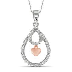 A beautiful take on the traditional heart pendant, this studded diamond pendant is sure to capture any heart. The classic heart shape is one of the most popular and universally accepted symbols of love... and what can express your true love better than our diamond heart pendant? Show family, friends, or that special someone how much they mean to you with our dazzling heart pendant. Our Two Tone Sterling Silver heart pendant is the perfect gift for expressing your love. Its the perfect present fo Sterling Silver Teardrop Jewelry With Heart Charm, Silver Teardrop Necklace With Heart Charm, Valentine's Day Heart Charm Teardrop Jewelry, Sterling Silver Diamond Cut Heart Pendant Necklace, Sterling Silver Teardrop Jewelry For Mother's Day, Silver Teardrop Pendant Jewelry For Mom, Valentine's Day Teardrop Pendant Jewelry For Anniversary, Valentine's Day Teardrop Necklace With Heart Charm, Valentine's Day Necklace With Heart Charm