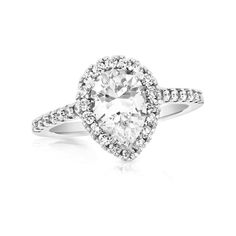 Bold and timeless, this diamond engagement ring ensures an unforgettable moment. Fashioned in 14K white gold, this beautiful look dazzles with a 1 ct. GIA-graded pear-shaped diamond boasting a color rank of I and clarity of Si2. Round diamonds line the frame and shank for a thoroughly sparkling design. Captivating with 1-1/3 cts. t.w. of diamonds and a bright polished shine, this engagement ring is worthy of her affection. This style arrives with a certificate that includes a photo and descripti White Gold Teardrop Diamond Ring, Pear-shaped Cubic Zirconia Wedding Jewelry In Diamond White, Teardrop Platinum Diamond Ring For Formal Occasions, Moissanite Teardrop Diamond Ring With Center Stone, Timeless Heart Cut Diamond White Wedding Ring, Proposal Ring With Pear-shaped Brilliant Cut, Teardrop Moissanite Diamond Ring With Center Stone, Dazzling Pear-shaped Diamond Ring With Prong Setting, Dazzling Teardrop Diamond Ring With Brilliant Cut