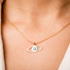 Handmade Gold Evil Eye and Hamsa Necklace, symbol of protection jewelry! 14K solid gold charm features a stunning evil eye pendant paired perfectly with the symbolism of spiritual protection. The symbol is believed to ward off negative energies so it's a protective amulet both stylish and meaningful, the ideal gift for yourself or someone dear to you. 🧿 GOLD EVIL EYE NECKLACE * It's handmade & personalized. You can personalize everything about this custom necklace. * Combines style and protecti Gold Plated Evil Eye Symbolic Jewelry, Gold Evil Eye Symbolic Necklace, Symbolic Gold Plated Evil Eye Jewelry, Gold Evil Eye Amulet Jewelry, Yellow Gold Evil Eye Spiritual Necklace, Spiritual Yellow Gold Necklace With Evil Eye, Spiritual Gold Eye-shaped Necklace, Spiritual Yellow Gold Evil Eye Necklace, Symbolic Yellow Gold Evil Eye Necklace