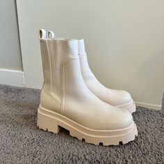 Size: 6 Never Worn White Synthetic Boots With Round Toe, White Synthetic Boots With Flat Heel, White Round Toe Summer Boots, White Synthetic Flat Heel Boots, Cream Round Toe Boots For Spring, White Almond Toe Boots For Summer, White Almond Toe Summer Boots, White Boots With Lug Sole For Spring, Spring White Boots With Lug Sole