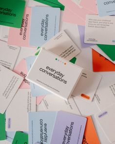 many different colored business cards with the words energy conversations written on one side and below them