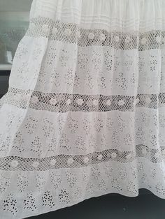 Antique petticoat in fine white cotton voile, embroidered and crocheted Irish lace Religious folds Attaches with a non-sliding cord Length approximately 54 cm Waist size 64 cm Width at the bottom about 170 cm Very beautiful old petticoat in good condition Irish Lace Crochet, Irish Lace, Irish Crochet, Cotton Voile, Petticoat, Waist Size, White Cotton, Hand Embroidery, Bathing Beauties