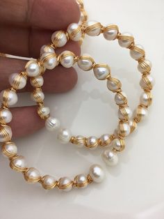 quantity: 1 pc pearl jewelry: pearl bangle length: 7 inches pearl grade: AA+ pearl luster: high pearl shape: potato pearl size: around 7mm pearl color: white macth necklace: https://www.etsy.com/listing/734498829/17-aaa-65-7mm-misc-color-button-round?ref=listings_manager_grid match earrings: https://www.etsy.com/listing/201118982/3-dollars-promote-for-opening-gray-pearl?ref=shop_home_active_13&ga_search_query=grey match bracelet: can use this grey pearl make to bracelet, 6USD Back to Other Jewel Elegant White Wire Wrapped Pearl Bracelet, Beaded Pearl White Round Bracelet, Baroque Pearl Bracelet With Pearl Drop In Pearl White, Pearl White Beaded Round Pearl Bracelet, Pearl White Baroque Pearl Bracelet With Pearl Drop, Akoya Pearl Bracelet With Pearl Charm, Baroque Pearl Bracelet With Pearl Drop, Gold Pearl Bracelet With Pearl Drop, White Hoop Pearl Chain Jewelry