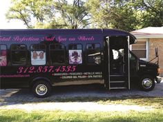 a tour bus parked in front of a house