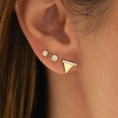 Delicate Triangle Stud earrings made in 14k / 18k yellow gold, featuring clear natural diamonds. In this listing, you can see the ring in YELLOW GOLD.  you can see and order in rose or yellow gold from the following links: ● White gold - www.etsy.com/listing/17694031331 ● Rose gold - www.etsy.com/listing/1769405567 ♦ DIAMONDS SPECIFICATIONS ♦  Pieces: 12 Total Carat Weight: 0.12ct Color: G + Clarity: VS + ♦ We work with high-quality diamonds, at the highest standards. ♦ The diamonds are 100% natural diamonds, without any kind of treatment. ♦ Our diamonds are conflict-free. ♦ The ring comes with our Jewelry certificate which we state all of the specifications of the diamonds. --DIMENSIONS-- The height is about 7 mm long The width is about 8.5 mm long --CUSTOMIZATION-- ● The earrings can be Modern Pierced Yellow Gold Ear Climbers, Modern Yellow Gold Pierced Ear Climbers, Modern Gold Earrings With Prong Setting, Modern 14k Gold Ear Climbers As Gift, Modern 14k Yellow Gold Ear Climbers, Diamond Gold Ear Climbers As Gift, Gold Diamond Ear Climbers For Gifts, Yellow Gold Ear Climbers In Fine Jewelry Style, Gold Diamond Ear Climbers For Pierced Ears