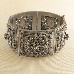 Balinese Style Vintage Cuff Bracelet, Ornate Cuff Victorian Cuff Bracelet With Intricate Design For Ceremonial, Victorian Cuff Bracelet With Intricate Design For Ceremonial Occasions, Victorian Style Ceremonial Cuff Bracelet With Intricate Design, Ceremonial Silver Cuff Bracelet With Intricate Design, Ornate Silver Cuff Bracelet For Festivals, Victorian Silver Bangle With Intricate Design, Antique Silver Cuff Bracelet With Oxidized Finish, Balinese Style, Vintage Sapphire Ring