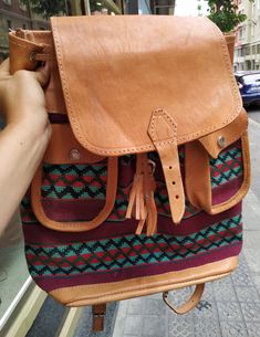 "Welcome! Amazing Vintage Leather and fabric Backpack In very good condition, i think never use A lot of pockets Measures: H: 14.56\" (37 cm) W: 13.77\" (35 cm) Deep: 3.54\" (9 cm) Thanks for stopping by!!IMPORTANT: Due to the delicate situation We're all going through, and in order to keep the safety of courier workers too, all orders will be dispatched when alert sanitary finished. You can purchased or reserve items like always. Thanks so much for your understanding." Rectangular Leather Backpack With Leather Trim For Travel, Rectangular Leather Trim Backpack For Travel, Vintage Leather Backpack For Trips, Vintage Satchel Backpack For Trip, Vintage Standard Backpack For Trips, Vintage Brown Backpack For Trip, Brown Vintage Backpack For Trips, Casual Brown Leather Backpack With Luggage Sleeve, Leather Trim Shoulder Backpack For Daily Use