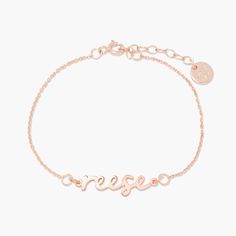 Crave the perfect personalized piece? Look no further than the Nella Nameplate Bracelet. This exquisite accessory features a delicate, yet strong cable chain encasing a beautifully crafted nameplate. You'll love wearing it and showing it off! So, are you ready to make a statement with the Nella Nameplate Bracelet? Available in sterling silver, 18k gold plated or 18k rose gold plated silver Nameplate size: 1/4" tall, length varies 6" cable chain with 1" extender Spring ring closure This is a lowe Elegant Nameplate Bracelet With Adjustable Chain, Personalized Elegant Name Bracelet For Friendship, Elegant Rose Gold Name Bracelet With Adjustable Chain, Personalized Gift Name Bracelet With Adjustable Chain, Elegant Personalized Chain Bracelet For Friendship, Elegant Engraved Chain Bracelet For Friendship, Elegant Rose Gold Name Bracelet For Friendship, Elegant Rose Gold Friendship Bracelet, Elegant Name Bracelet With Adjustable Chain