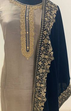 Item Overview ATHARVA Hand Embroidery Salwar Kameez/Embroidery Neck Grey Silk/Zari Embroidery Border Dupatta Velvet/Custom Stitch/Churridars/ Dno. VL01A Fabric: * Shirt: Uppada Silk -Grey - 2.5 Mts, with Beautiful Embroidery Neck * Dupatta: Velvet Dupatta 2.5Mt- Heavy Zari Embroidery- Navy Blue * Salwar: Santoon Silk 2.5 Mts. Excusive Hand Embroidered Party Wear Punjabi Suit. Customization: * Fabrics Customization: Designs Can be made in different Fabrics. *Color Customization: Designs Can be ma Patiala Salwar Kameez, Velvet Dupatta, Embroidery Border, Zari Embroidery, Patiala Salwar, Embroidered Pants, Punjabi Suit, Gray Silk, Beautiful Embroidery