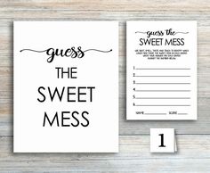 guess the sweet mess printable card and matching notepads are on top of a wooden table