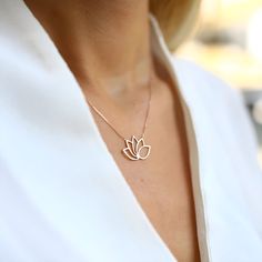 18K Solid Gold Lotus Necklace 🌸 Embrace Tranquility with the 18K Solid Gold Lotus Necklace 🌸 🌟 Product Features: ⚖️ Weight: 2.10 Grams 🌈 Material Colors: Available in Yellow Gold, Rose Gold, and White Gold 📏 Chain Lengths: 17 inches (43 cm), 18 inches (46 cm), 19 inches (48 cm), 20 inches (51 cm) 🎁 Presentation: Shipped with a special box and bag, perfect for gifting 🔄 Returns: Right to return within 7 days ✨ Material and Color: Designed to never fade or darken 🛠️ Handcraftsmanship and U Elegant Sterling Silver Jewelry For Meditation, Exquisite Flower Shaped Necklace For Gift, Elegant Flower Pendant Necklace For Meditation, Spiritual Gold Necklace With Flower Pendant, Spiritual 14k Gold Flower Pendant Jewelry, Spiritual Gold Flower Pendant Necklace, Meditation Symbols, Spiritual Gold-plated Flower Pendant Necklace, Spiritual Lotus Flower Necklace Gift