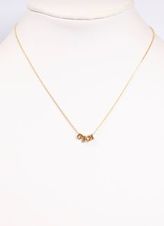 Calling all Grandmothers! This GiGi necklace is a perfect way to celebrate Mother's Day! It comes on a card that reads, "I am a remarkable woman. I am a wonderful combination of warmth and kindness, and laughter and love. My favorite people call me GIGI." It is made of brass and 18K gold dipped. Nickel and lead free. Dimensions: 16" 2" extender Initial Pendant Charm Necklaces For Mother's Day, Mother's Day Initial Pendant Charm Necklace With Adjustable Chain, Initial Pendant Necklace With Delicate Chain For Anniversary, Gold Birthstone Necklace For Mother's Day Anniversary, Anniversary Necklace With Delicate Chain And Initial Pendant, Mother's Day Yellow Gold Birthstone Necklace For Mom, Yellow Gold Birthstone Necklace For Mother's Day, Mother's Day Diamond Necklace, Anniversary Mother's Day Adjustable Chain Necklace