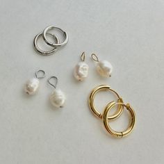 These freshwater pearl hoop charms come in a great addition to your hoop charm collection.   PRODUCT DETAILS:  - Natural freshwater pearls - 8mm x 9mm - Sold as a pair (charms only) - Choose gold or silver loop (stainless steel) Perfect to pair with these hoops: https://www.etsy.com/listing/1688754322/hoop-earrings-for-charms-5-sizes?click_key=b69efa522ba8189da30669ca50f5d99d0d061c15%3A1688754322&click_sum=85eaf496&ref=shop_home_active_2&pro=1&frs=1&sts=1 Care Instructions: We highly recommend t Everyday Hoop Jewelry With Pearl Charm, Classic Huggie Jewelry With Pearl Charm, Everyday Pearl Charm Hoop Earrings, White Pearl Charm Hoop Earrings, Everyday Pearl Charm Huggie Jewelry, Hypoallergenic Pearl Hoop Earrings, White Pearl Hoop Earrings With Pearl Charm, Everyday Small Hoop Jewelry With Pearl Charm, Everyday Huggie Jewelry With Pearl Charm