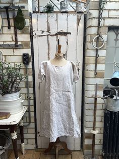 Antique French cream unbleached linen flax dress initials AB size S/M. 100% Linen. Round neck with tie and red initials "AB", short sleeves, side darts, A-line shape - simple shift dress. Size:  Chest: 40 inches; Shoulder to shoulder: 18 inches; Length: 39.5 inches. Weight: 530g (allow 1 kg once packed). Good condition. For a larger selection of similar items, visit my website - www.AntheasAttic.co.uk (link on About page). Please contact me if you would like to buy more than one item and I can c Fitted Cream Linen Dress, Short Sleeve Flax Linen Dress, Short Sleeve Linen Dress In Flax Color, Cream Linen Short Sleeve Dress, Cream Linen Dress With Short Sleeves, Cream Short Sleeve Linen Dress, Flax Dress, French Cream, Dress Clothes For Women