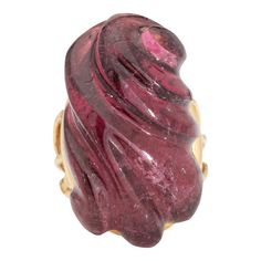 This is part of Chairish’s Fine Jewelry assortment.  Stylish vintage carved tourmaline ring crafted in 18 karat yellow gold (circa 1960s to 1970s).   Carved pink tourmaline measures 27.5mm x 16mm. The tourmaline is in very good condition and free of cracks or chips.    The unique ring highlights a beautiful pink tourmaline, carved in a scrolled form that resembles a shell-like design. The tourmaline is a medium to dark pink color and lights up in natural sunshine. The cocktail ring makes a bold statement on the hand and rises 13.5mm (0.53 inches), sitting comfortably on the finger.    The ring is in good condition and was lightly cleaned and polished.  Particulars:  Weight: 14.4 grams  Stones:  Carved pink tourmaline measures 27.5mm x 16mm. The tourmaline is in very good condition and free Dark Pink Color, Vintage Cocktail Ring, Cocktail Jewelry, Fancy Yellow Diamond, Pink Tourmaline Ring, Ocean Jewelry, Diamond Cocktail Rings, Tourmaline Stone, Ring Crafts