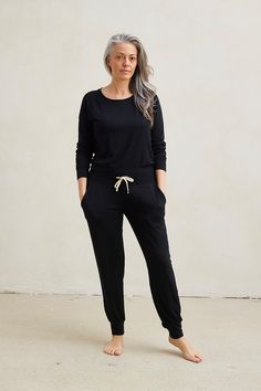 The Loungewear Set You've Been Dreaming Of. Combine the stylish and comfortable Harem Pants with the loose Relaxed Long Sleeve Top to create the loungewear set of your dreams! Made from our signature ultra-soft and moisture-wicking fabric blend. Includes a Relaxed Long Sleeve Top and Harem Pants. Made in Canada. Ultra-soft 93% Viscose from Bamboo / 7% Spandex. XS (0-2), S (0/2-4/6), M (6-8/10), L (10-12/14), XL (14-16/18), XXL (18-20/22). Machine washable & dryer friendly. Fabric patterns designed by and exclusive to This Is J. Comfy Black Activewear For Loungewear, Versatile Joggers For Loungewear, Versatile Relaxed Fit Activewear For Loungewear, Comfortable Fall Joggers For Relaxation, Sporty Joggers For Relaxation In Fall, Casual Black Sweatpants For Relaxation, Black Casual Sweatpants, Relaxed Black Pants For Everyday, Relaxed Black Everyday Pants