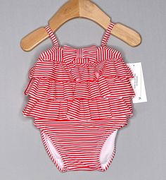 Red and white striped one-piece swimsuit from Janie and Jack in size 3-6 months Tiers of ruffles on the top half Bow trim on the front Fully lined UPF 50+ sun protection Nylon/spandex blend All brands are unique, so be sure to check the measurements below before purchasing. I combine shipping, so please visit my store if you're looking for more! Approximate measurements (done one side, laid flat): Full length: 13" Width under arms: 8" Ruffle Swimsuit, Striped One Piece, Janie And Jack, Baby & Toddler Clothing, Red And White Stripes, Toddler Outfits, Upf 50