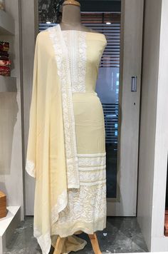 A stunningly marvellous outfit featuring Croatia Lace and Kashmiri Aari Embroidery. - - - - - - - - - - - - - - - - - - - - Product Details- Condition: Brand New- Style: Salwar Suit- Embroidery: Kashmir Aari & Croatia Lace- Base Color: Yellow/Pink- Embroidery Color: WhiteF A B R I CShirt: ChinonDupatta: ChinonLower: Indian Crepe**Kindly Note lace used may vary a bit depending upon the availability.F I N I S HUnstitched/Semi-StitchedYou can get it stitched locally.47+ inches of Shirt Length and u Indian Suit For Women, Indian Crepe, Kashmiri Suits, Indian Suits For Women, Suit Indian, Suit Embroidery, Indian Suit, Embroidery Product, Traditional Suit