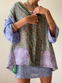 "This is short patchwork blouse super comfy wrap tie and free size Suitable for men and ladies Made of vintage silk materials with different patterns Always one of a kind, perfect on your holiday at the beach or as a street style boho cover up Easy to wear and flowy MEASURE Shoulder up to 23\" Bust up to 42\" Waist up to 42\" Length 40\" MATERIAL *up-cycled vintage silk CARE INSTRUCTIONS Wash separate in warm water * Hand wash recommended * Hang to dry IMPORTANT NOTE Please note that colour show Patchwork Blouse, Hippie Party, Kimono Blouse, Patch Work Blouse, Flowy Shirt, Silk Material, Style Boho, Party Shirts, Vintage Silk