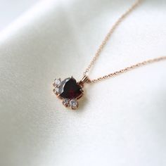 Garnet heart necklace 💝 * Details * Material : sterling silver with plate, 14k solid gold Color : Gold, white or rose gold Pendant Size : 11*8mm Heart stone : 7*7mm Round stone : 2.5mm, 1.7mm Chain Length : 16.5inch(If you want longer chain, please leave the length you need at the order note) We provide gift package with some our business card, Guarantee card, zip bag and caring tips card. Please check our shop policies and we love to hear from you about anything. Rose Gold Heart Pendant Necklace Fine Jewelry, Gift Sterling Silver Heart Necklace, Tarnish Resistant, Rose Gold Heart Charm Fine Necklace, Gift Sterling Silver Heart Necklace Tarnish Resistant, Rose Gold Heart Pendant Necklace For Her, Rose Gold Heart Pendant Necklace Gift For Her, Fine Jewelry Rose Gold Necklace With Heart Charm, Rose Gold Fine Jewelry Necklaces With Heart Charm, Rose Gold Heart Pendant Charm Necklace