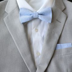 Color:  Sky Blue Imported and Handmade Material:  100% Cotton Adult Necktie Dimensions:  Skinny Width:  2.25 inches   Regular Length:  approx. 58 inches Adult Pre-Tied Bow Tie: approx. 4.75 inch width by 2.5 inch height Necksize 11.5 inches - 20 inches     Metal clasp for secure and comfortable wear. Child Pre-Tied Bow Tie:  approx. 4 inch width and 2 inch height   Necksize 11 inches - 19 inches    Plastic clasp for easy wear and removal. Pocket Square: 9 inches x 9 inches RETURN/EXCHANGE POLICY:  Please notify/message seller regarding an exchange and/or return within 30 days after delivery of package to open a case and we will walk you through the next steps.     CUSTOMER SERVICE:  We strive to provide the best customer service and products to our customers.  Please don't hesitate to cont Blue Tie With Pocket Square For Business, Blue Ties With Pocket Square For Business, Dapper Tailored Blue Suit And Tie Accessories, Tailored Blue Formal Tie, Tailored Blue Suit And Tie Accessories For Business, Dapper Tailored Ties For Wedding, Blue Fitted Suit And Tie Accessories For Black Tie, Dapper Blue Standard Tie, Dapper Blue Business Ties