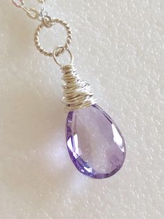 Lovely genuine amethyst pear briolette in Rose de France lilac pink color. Wire wrapped in Sterling silver on delicate Sterling silver cable chain with spring ring clasp. Luxe AAA faceted gemstone is 13 x 8mm. Also available in 14k good fill. Beautiful spring color! Pear-shaped Amethyst Jewelry As Gift, Pear-shaped Amethyst Necklace As A Gift, Pear-shaped Amethyst Necklace For Gift, Gift Pear-shaped Amethyst Necklaces, Gift Pear-shaped Amethyst Necklace, Lapis Necklace, Lilac Pink, Spring Color, February Birthstone