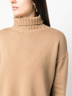 Stay cozy and stylish in this luxurious wool-cashmere blend turtleneck sweater. Perfect for chilly days, it features a classic roll neck, long sleeves, and ribbed cuffs and hem. With its short side slits, it's the perfect combination of comfort and sophistication. Camel brown color Wool-cashmere blend Knitted construction Roll neck Long sleeves Ribbed cuffs and hem Short side slits Camel Sweaters, Turtle Neck Sweater, Sweater Sale, Short Leggings, Knitwear Cardigan, Sweaters Knitwear, Roll Neck, Knitted Jumper, Max Mara