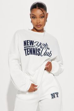 Available In White. Crew Neck Sweatshirt Long Sleeve Front Screen Embroidery Seaming Detail Disclaimer: Due To The Embroidery Placement , Each Garment Is Unique. 100% Polyester Imported | New York Tennis Social Club Sweatshirt in White size XS by Fashion Nova White Sweatshirt With Embroidered Graphics For Loungewear, Oversized White Sweatshirt With Letter Embroidery, White Embroidered Graphics Sweatshirt For Loungewear, White Embroidered Sweatshirt For Loungewear, White Sweatshirt With Letter Embroidery For Loungewear, White Letter Embroidery Sweatshirt For Loungewear, White Embroidered Logo Sweatshirt For Loungewear, White Sporty Sweater With Text Print, Sporty White Sweater With Text Print