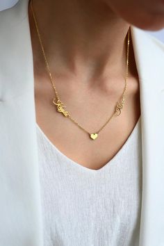 14k solid gold Two Name Necklace, Gold Name Necklace, Gold 2 names necklace, Dainty Name Necklace, Personalized Jewelry, Mothers Day JewelryMaterial: High Quality 14K Solid Gold     Not gold filled or gold platedKARAT: 14 K real goldChain: 14K Solid Gold Chain is includedColor: 14K Yellow GoldFinish: PolishedDimensions:Uppercase letter: 6 mm in heightLower case letter: 4 mm in heightUsually only the first letter is upper case, please let me know exactly as you want it to appearAll our jewelry is Name Pendant Necklaces For Anniversary, Name Pendant Necklace For Anniversary, Nameplate Necklace For Anniversary, Nameplate Necklace For Anniversary Gift, Anniversary Gift Nameplate Necklace, Yellow Gold Pendant Name Necklace For Anniversary, Yellow Gold Custom Name Heart Pendant Necklace, Gold Name Necklaces For Anniversary, Name Pendant Necklaces For Weddings