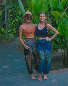 Handmade in Thailand 100% Natural Rayon Model is wearing Elastic Waist Pants in size M/ONE SIZE Machine wash in cold water for best results Our Bohemian Harem Pants are handmade in Thailand with natural rayon and they are very light and comfortable to wear, especially in warm climates as the material breathes well. The pants are perfect for lounging or sleeping at home. They are also great for taking a walk along the beach or practicing yoga anywhere you choose. The designs are very stylish and Festival Pants Bohemian, Harem Pants Fashion, Best Souvenirs, Thai Pants, Black Harem Pants, Bohemian Pants, Pin Up Girl Vintage, Dream Honeymoon, Hippie Culture