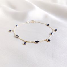 This stunning bracelet is set in 14k Solid Yellow Gold with Natural Blue Sapphire. It is an unique and dainty gemstone  bracelet for nearly every occasion and is completely hassle-free jewelry. ITEM DETAILS: * Gem: Blue Sapphire * Gem Size: 3mm (4pcs) * Gem Shape: Round cut * Gem Size: 3x5mm (5pcs) * Gem Shape: Oval cut * Gem Weight: 2.81 carats * Gold Purity: 14KT * Gold Weight: 1.14 gram * Total Weight of the Bracelet: 1.70 gram ✔️The Gold purity is guaranteed and it comes with authentic 14KT Diamond Bracelet With Gemstone Accents As A Gift, Elegant 14k Gold Bracelets With Gemstone Accents, Party Jewelry With Gemstones In 14k Gold, Party Jewelry In 14k Gold With Gemstones, 14k Gold Gemstone Jewelry For Parties, Elegant Sapphire Faceted Bracelets, Party 14k Gold Gemstone Jewelry, Elegant Blue Diamond Bracelet In 14k Gold, Fine Jewelry Sapphire Gemstone Bracelets