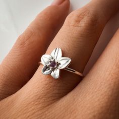 Title: Violet February Birth Month Flower Ring with  Amethyst Birthstone Material: Material:  Solid 14k Yellow Gold, 14k White Gold, 14k Rose Gold or solid 925 Sterling Silver.  18k and 9k Gold are available upon request. Timeline: Custom made to order (2 weeks) Size:  Stone: 2 mm genuine AA grade brilliant cut and 1.2-3 solid round band Special Options: I offer different gemstones upon request.  Story: Violet Flower: Amethyst Ring The violet has been thought to symbolize modesty, faithfulness, February Birth Month Flower, February Birth Flower, February Birth Flowers, Amethyst Birthstone, Solid Gold Chains, Amethyst Gem, Violet Flower, February Birthstone, Everlasting Love