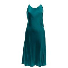 OLIVIA VON HALLE 100% silk turquoise green satin strappy slip dress Size 1 XS Reference: LNKO/A02183 Brand: Olivia Von Halle Material: Silk Color: Green Pattern: Solid Closure: Slip On Lining: Green Silk Extra Details: Buckles at straps adjustable. Made in: China CONDITION: Condition: Good, this item was pre-owned and is in good condition. Please refer to image gallery for thorough condition check. Minor stain at center front near neck. SIZING Designer size: UK8 Size reference: US2-4 / UK8 / IT40 / FR36 / XS-S MEASUREMENTS: Shoulder to shoulder: 21cm / 8.2" Chest: 36cm / 14" Waist: 40cm / 15.6" Hip: 43cm / 16.8" Length: 111cm / 43.3" This Olivia Von Halle item is authentic. Draped Silk Dress, Floral Tulle Dress, Olivia Von Halle, Vert Turquoise, Silk Shirt Dress, Printed Silk Shirt, Dolce Gabbana Dress, Turquoise Green, Puffed Sleeves Dress