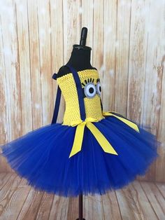 FREE SHIPPING on all orders within the US, no coupon code needed! Minion Tutu by Little Ladybug Tutus. Please check our website's home page for current turnaround time. Since all items are handmade at the time of purchase, there is a production time that varies. I hope my customers all understand that I am a one woman shop and create my items to surpass expectations. Every item ordered is handmade at the time of purchase. I also hope you understand that the wait is worth it! Shipping Information Costume Minion, Minion Tutu, Ladybug Tutu, Dresses Halloween, Tutu Dress Costumes, Minion Costumes, Birthday Party Dresses, 1st Birthday Tutu, Dresses Pageant