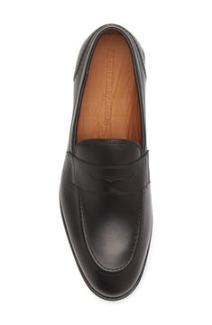 A streamlined silhouette and almond toe bring timeless sophistication to a leather loafer grounded by a cushioned footbed. Leather upper, lining and sole Made in the USA Timeless Slip-on Moccasins For Business, Timeless Business Slip-on Loafers, Timeless Plain Toe Slip-ons With Leather Sole, Timeless Business Slip-ons With Rubber Sole, Timeless Business Slip-ons With Round Toe, Formal Calf Leather Slip-ons With Leather Footbed, Timeless Slip-on Loafers With Leather Lining, Modern Formal Slip-ons With Leather Lining, Classic Slip-ons With Leather Footbed For Business Casual