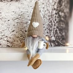 PRICES MAY VARY. Adorable Coffee Gnome Dolls - These cute coffee gnome dolls will please you with their kindness and charm. They want a place on your table, desk, fireplace, bookshelf, tiered tray, and more, creating a festive and welcoming home environment. Handmade and High-Quality Material - These handmade gnome figures are made of plush fabric and felt, soft, non-toxic, and neatly sewn. The coffee cups in their hands are made of felt cloth. The perfect gift - Scandinavian gnomes bring joy an Coffee Gnome, Swedish Tomte, Traditional Christmas Decorations, Doll Home, Led Christmas Lights, Christmas Wall Decor, New Years Decorations, Coffee Lover Gifts, Christmas Gnome