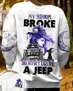 the back of a woman's white shirt with purple ink and an image of a truck